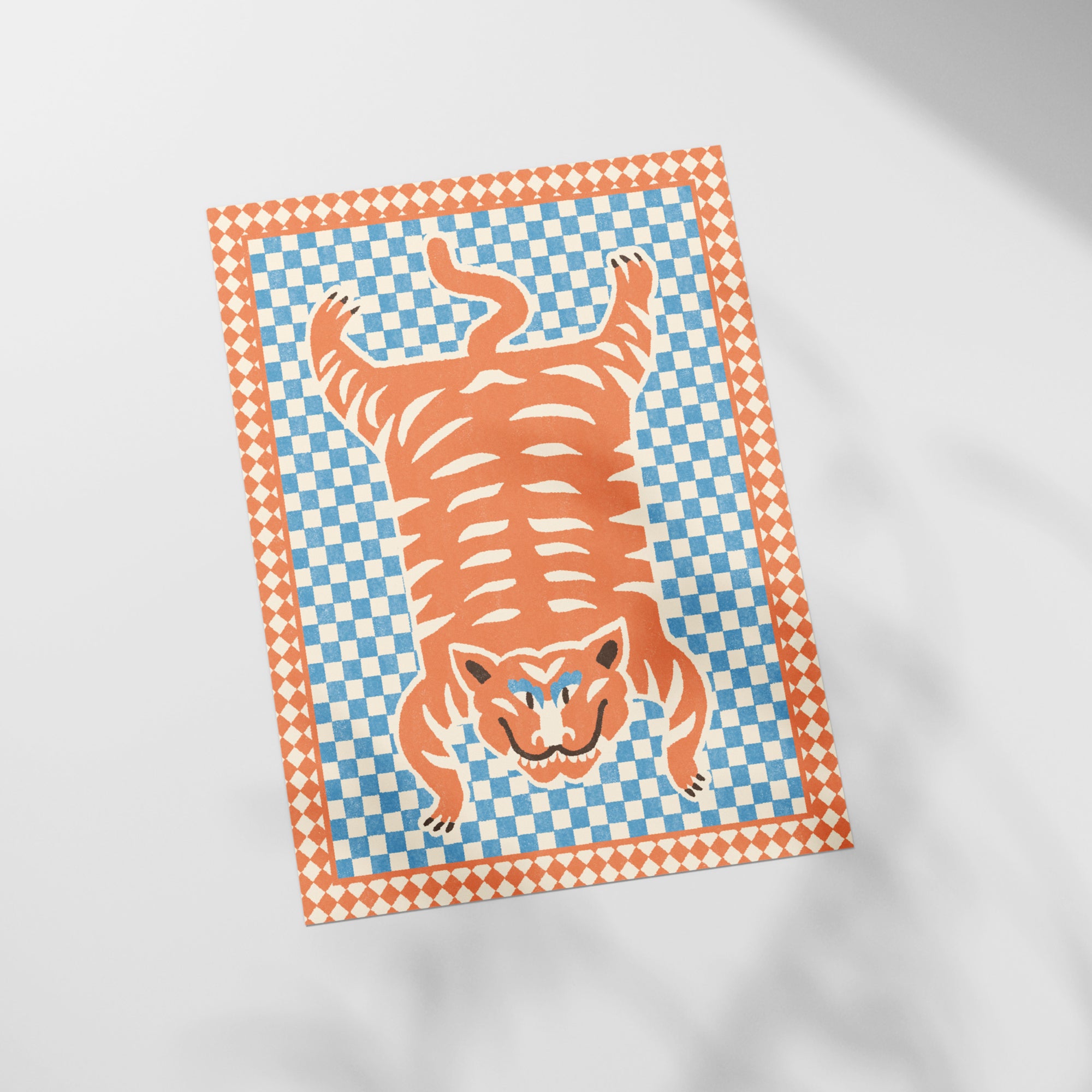 a picture of a tiger on a checkered paper