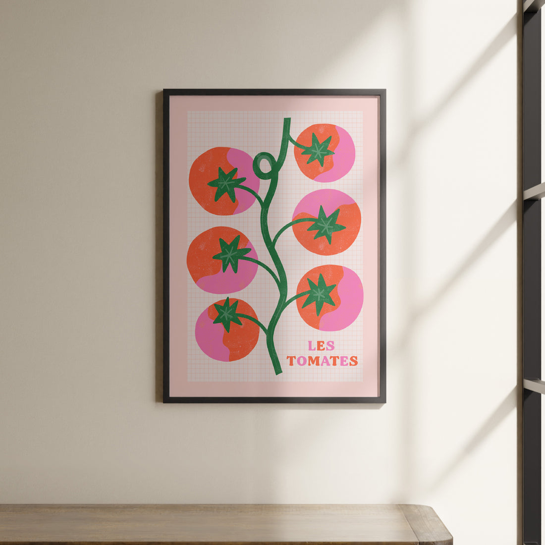 a picture hanging on a wall above a shelf