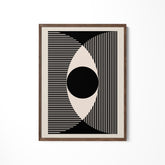 a black and white picture hanging on a wall