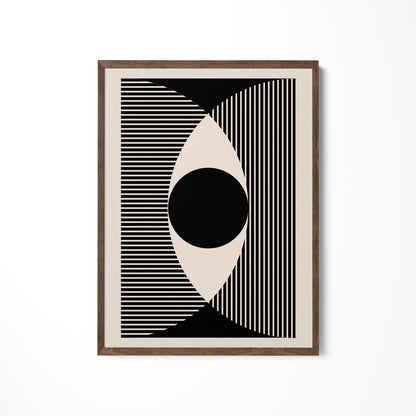 a black and white picture hanging on a wall