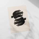 a piece of paper with a picture of two birds on it
