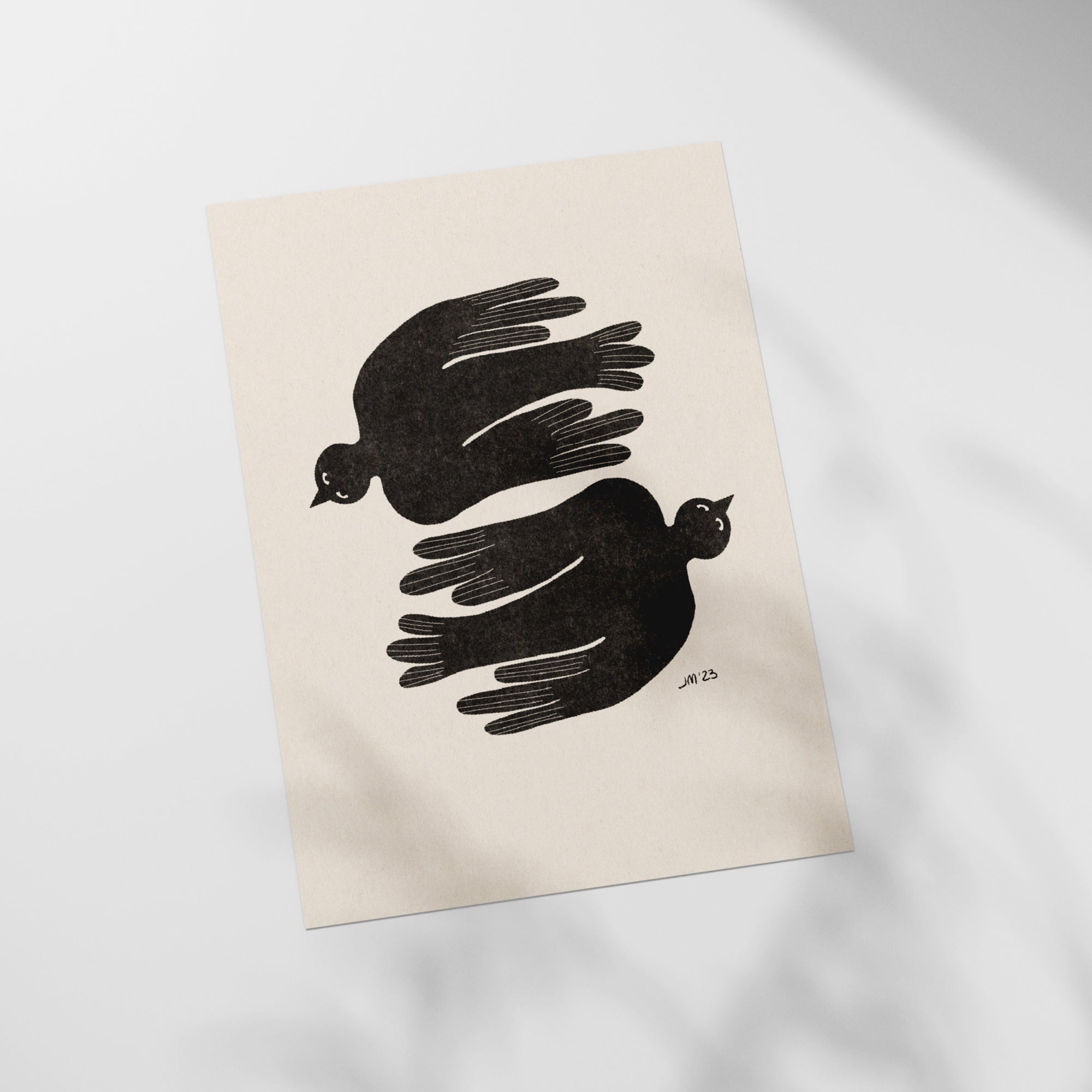 a piece of paper with a picture of two birds on it