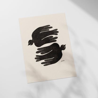 a piece of paper with a picture of two birds on it
