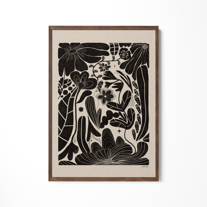 a black and white drawing of flowers on a wall
