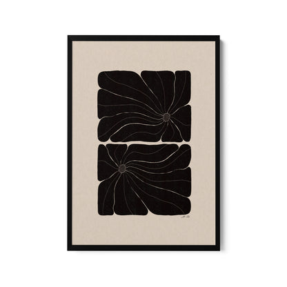 a black and white print with a flower on it