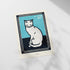a picture of a cat sitting on a table