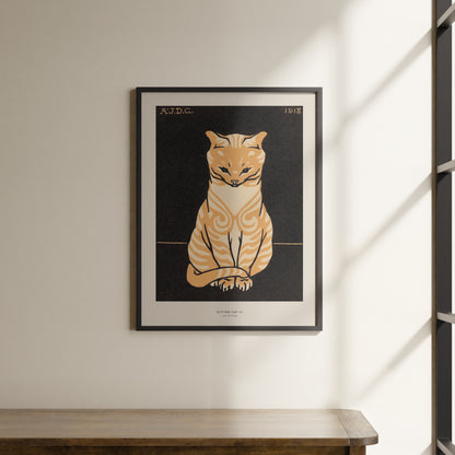 a picture of a cat is hanging on a wall