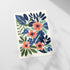 a card with a floral design on it