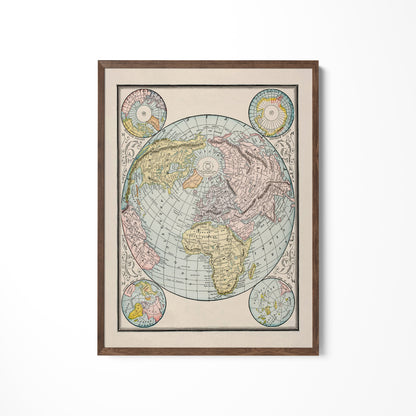 a framed map of the world hanging on a wall