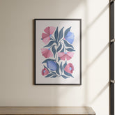 a picture hanging on a wall above a shelf