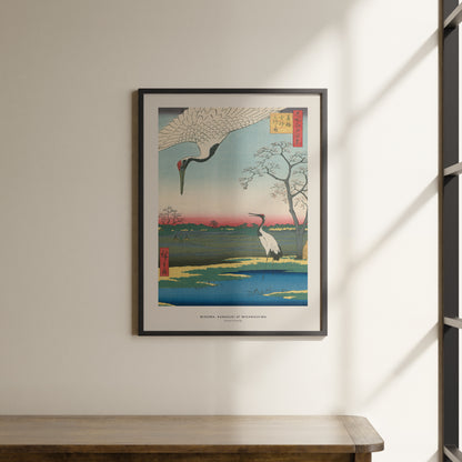 a painting hanging on a wall next to a wooden table