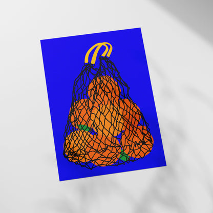 a picture of a bag of oranges on a table