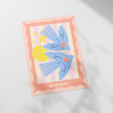 a close up of a card with a bird on it