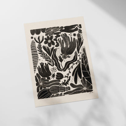 a black and white drawing of flowers and plants