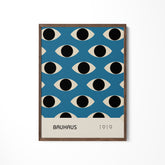 a blue poster with black and white circles on it
