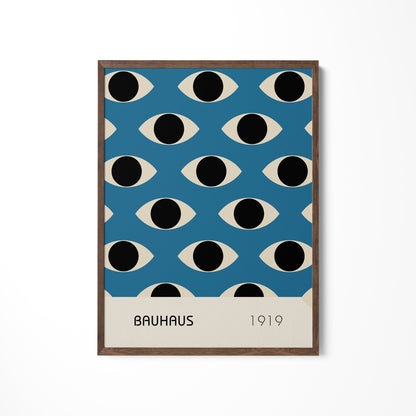 a blue poster with black and white circles on it
