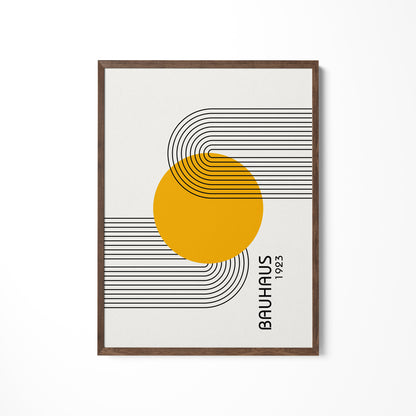 a picture of a yellow circle on a white wall